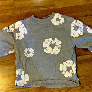 Gray denim tears, long sleeve T-shirt with white floral design